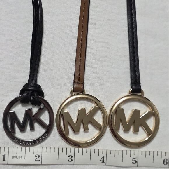 Michael Kors Handbags - Michael Kors Medium Logo Hangtag